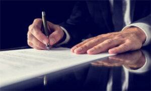 Sacramento Estate Planning Lawyer- man writing document